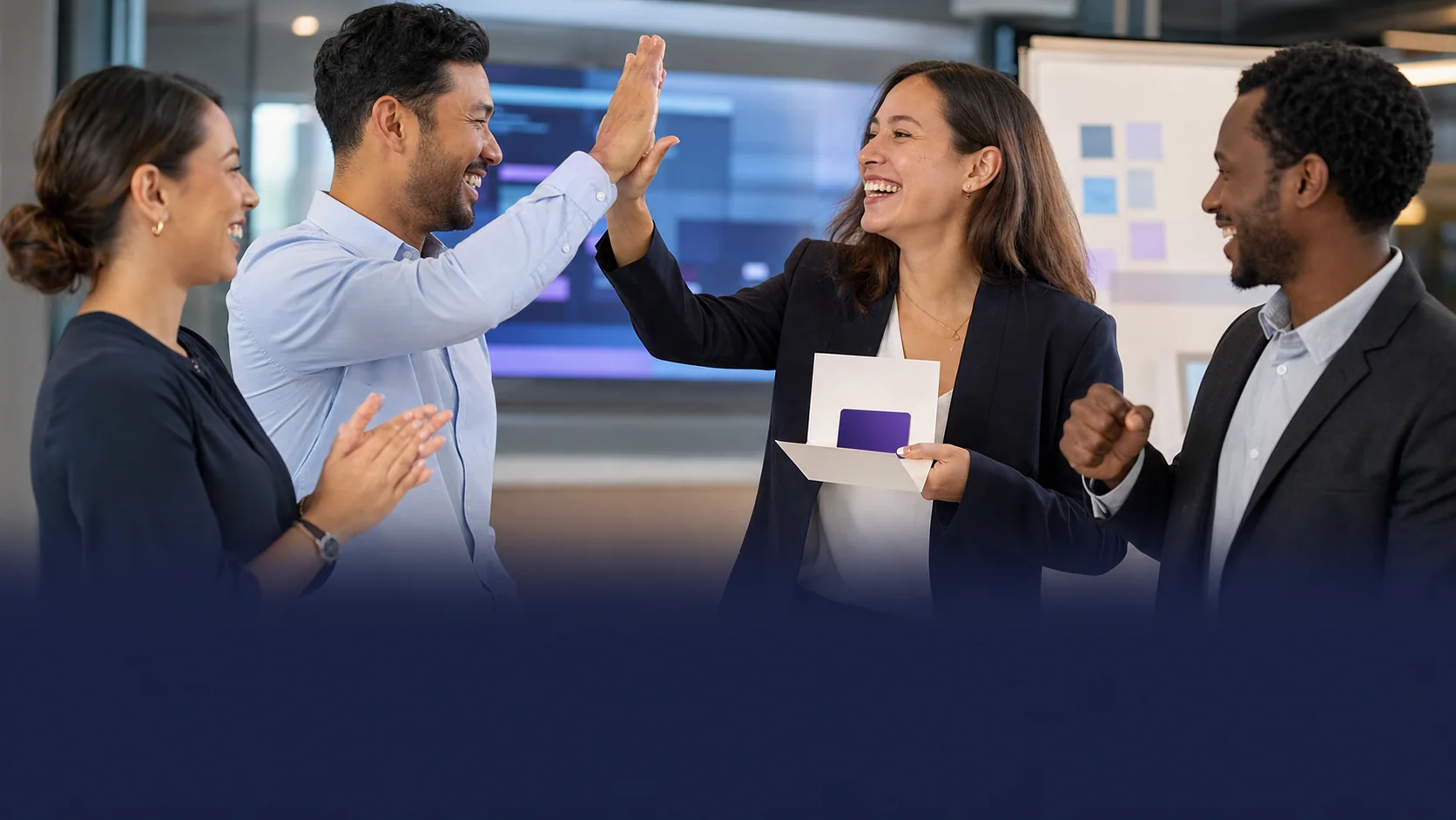 A sales team celebrating a shared result